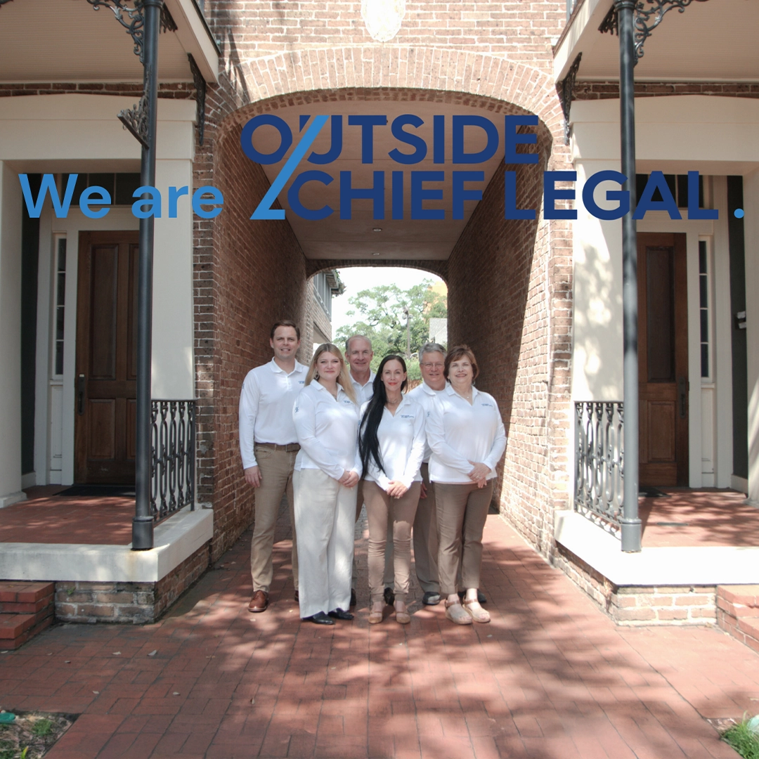Group photo outside - we are outside chief legal